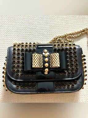 Authentic Christian Louboutin Black Studded Bow Crossbody Bag with Gold Accents